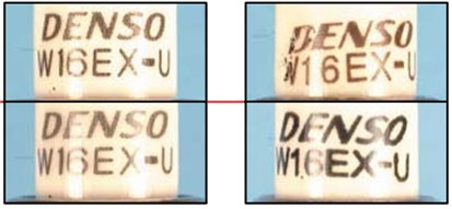 Các ký hiệu trên bu-gi Denso thật (trái) sắc nét hơn bu-gi giả. 